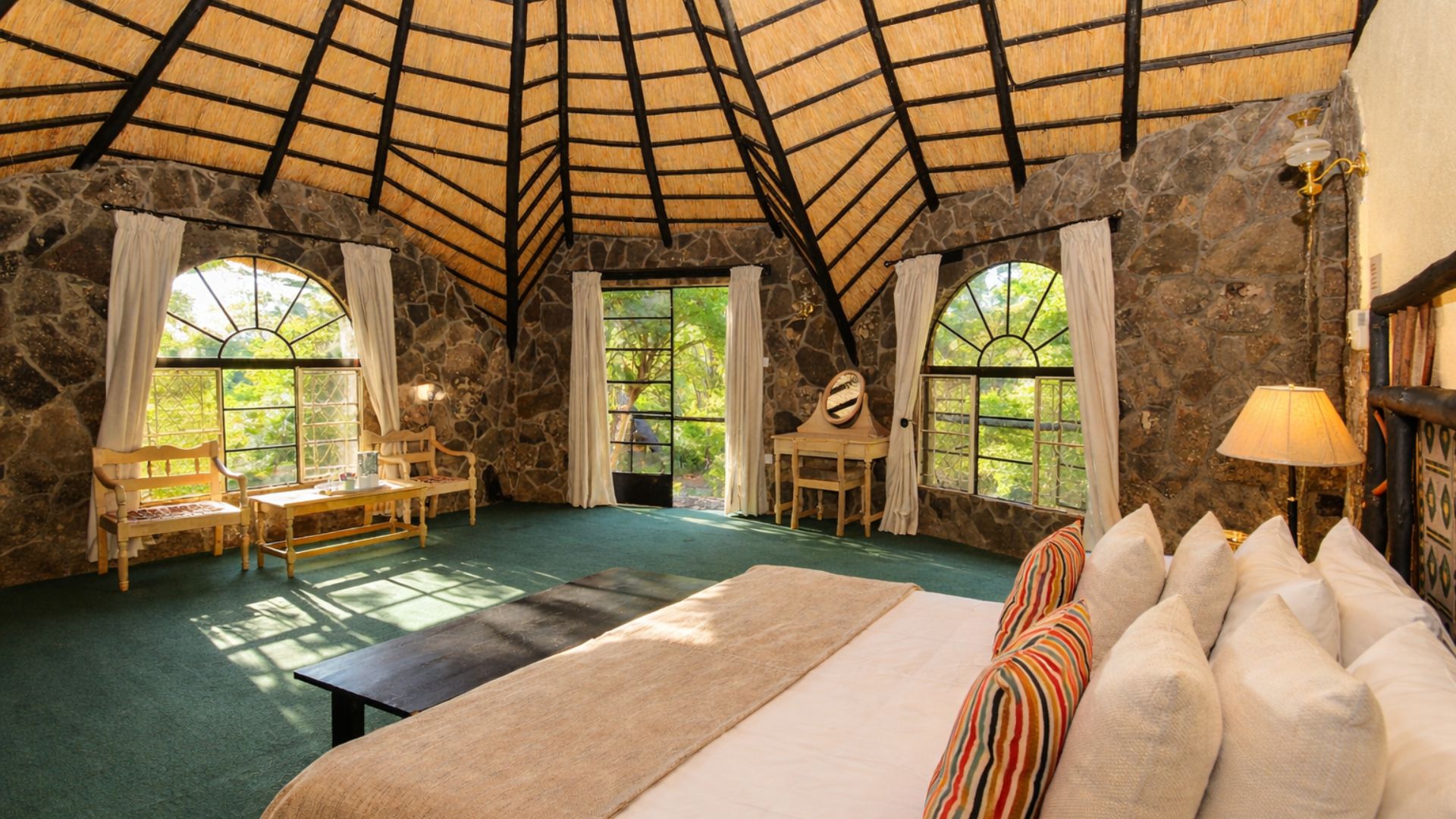 Lodge bedroom interior with view through window