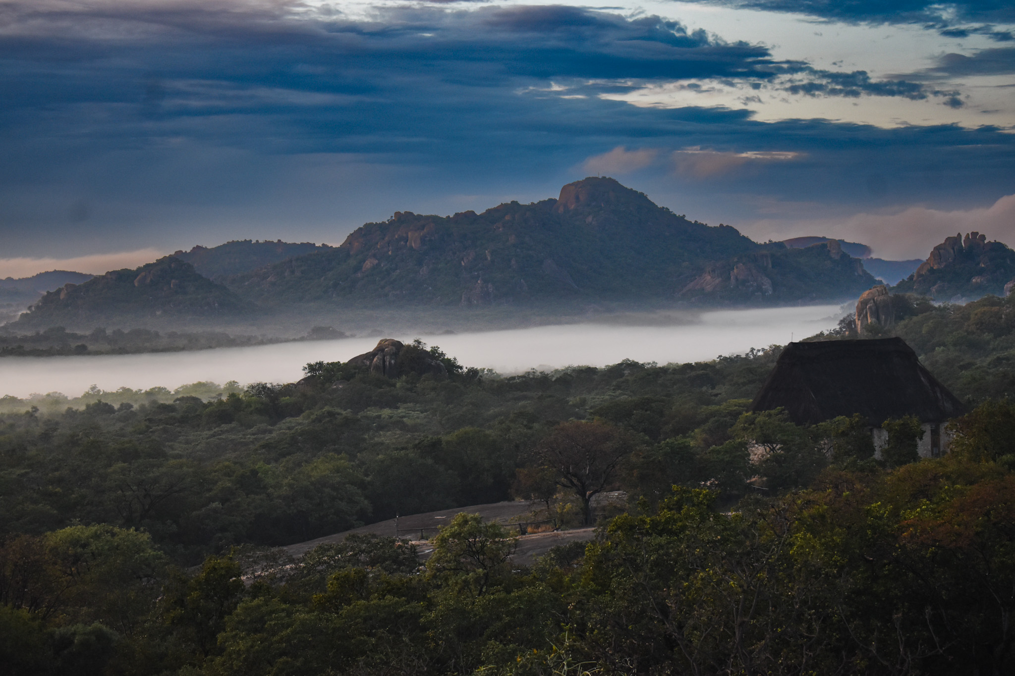 Cool dawn mist over Matobo kopjes in April light