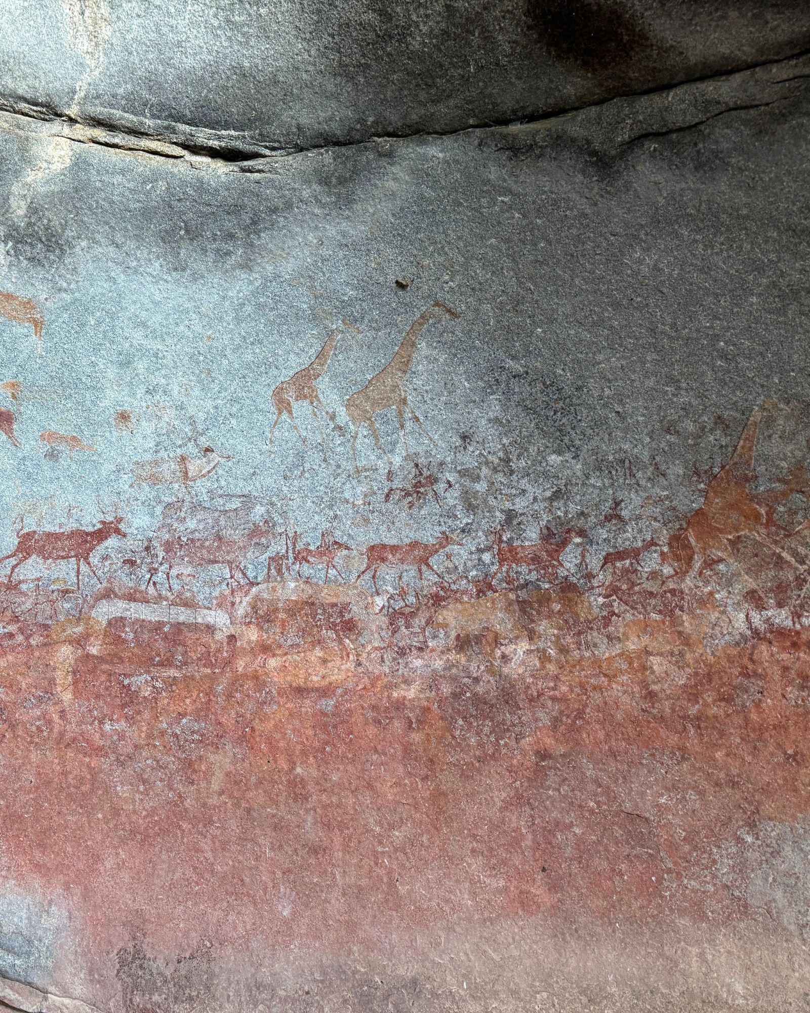Mineral pigments on granite inside a Matobo rock art cave